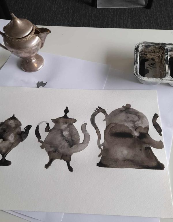 Painting of teapots with black Ink